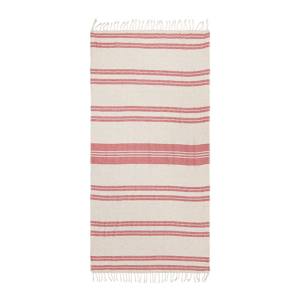 Turkish cotton peshtemal with linen-style stripes and fringed edges lightweight and ideal for beach, spa, or retail use.
